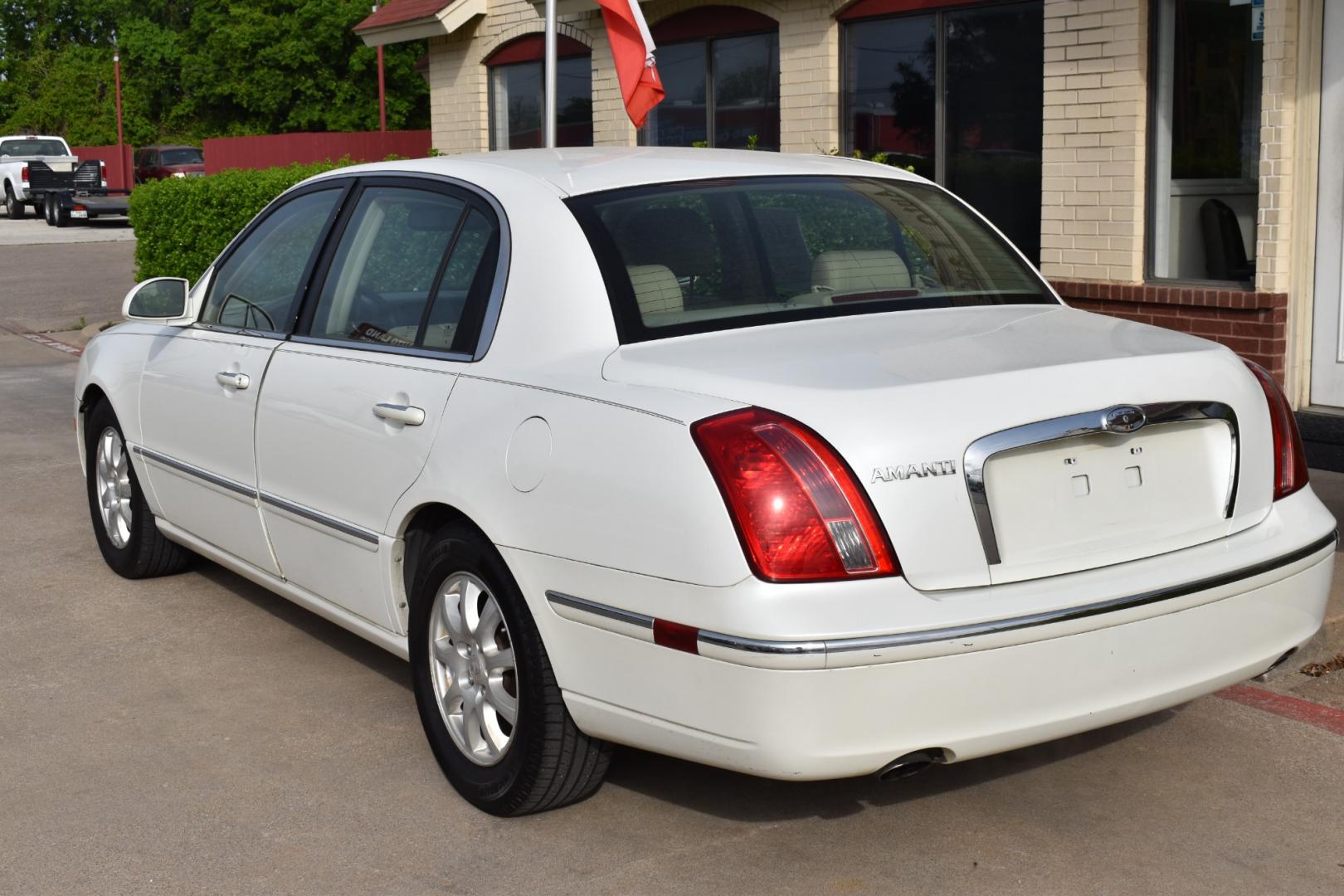 2008 White /Gray Kia Amanti (KNALD125X85) with an V6 3.8L engine, 5 SPEED AUTOMATIC transmission, located at 5925 E. BELKNAP ST., HALTOM CITY, TX, 76117, (817) 834-4222, 32.803799, -97.259003 - Deciding to purchase a 2008 Kia Amanti sedan depends on your specific needs and preferences, but there are several potential benefits to consider: Value for Money: The Kia Amanti was known for offering a lot of features for its price point, making it a compelling option for buyers looking for a wel - Photo#2